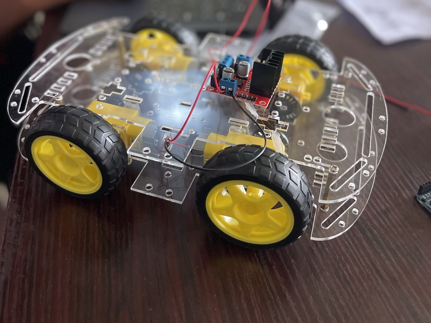 The bare chassis on its wheels, motors wired, nothing else on it yet